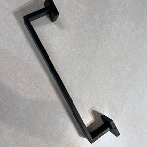 Sleek Black Metal Towel Bar